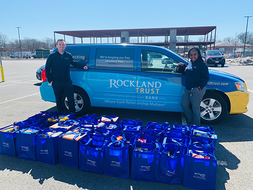 Rockland Trust van with bags of food getting ready to be delivered to food bank.